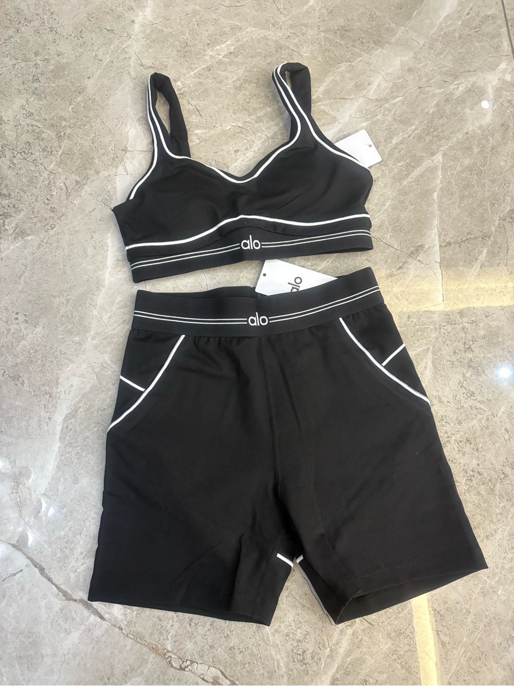 ALO Yoga Black Sports Bra and High-Waist Bike Shorts Set with White Trim